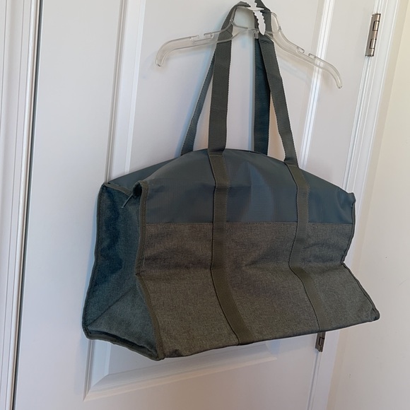 New roomy green sage colored duffle bag, outside pocket, full zipper closure. - Picture 2 of 7